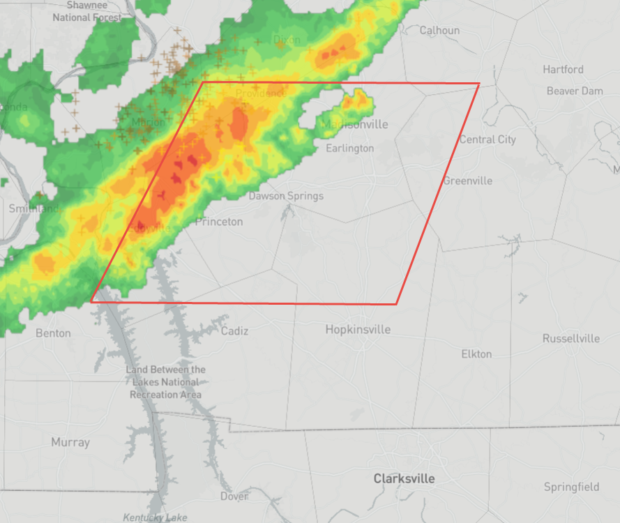 Radar image of a real NWS severe thunderstorm warning in western Kentucky: a line of storms moving northeast along the northwest edge of a large red warning polygon, with the southeastern half of the polygon clear of any storm